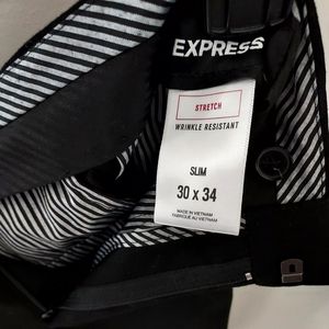 Mens Express dress pants.  69% Polyester, 29% Rayon, 2% Spandex